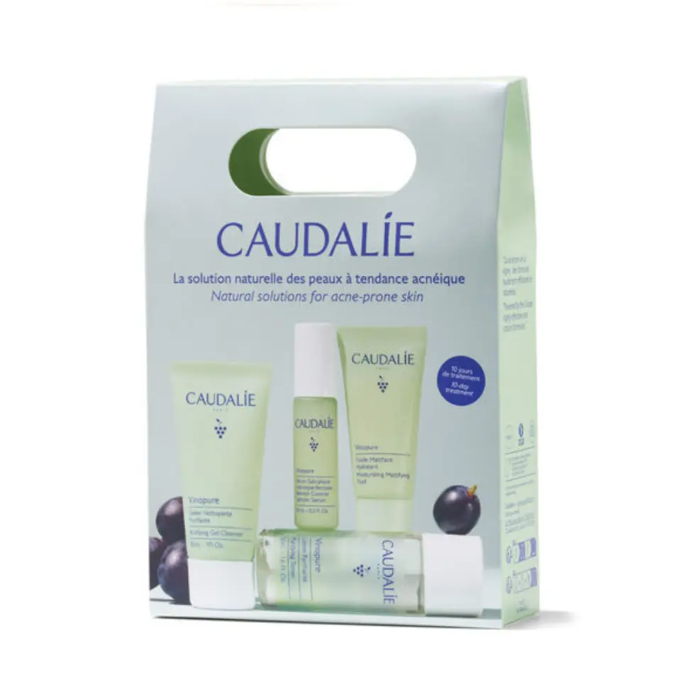Caudalie skincare set for acne-prone skin, includes cleanser, serum, and moisturiser.