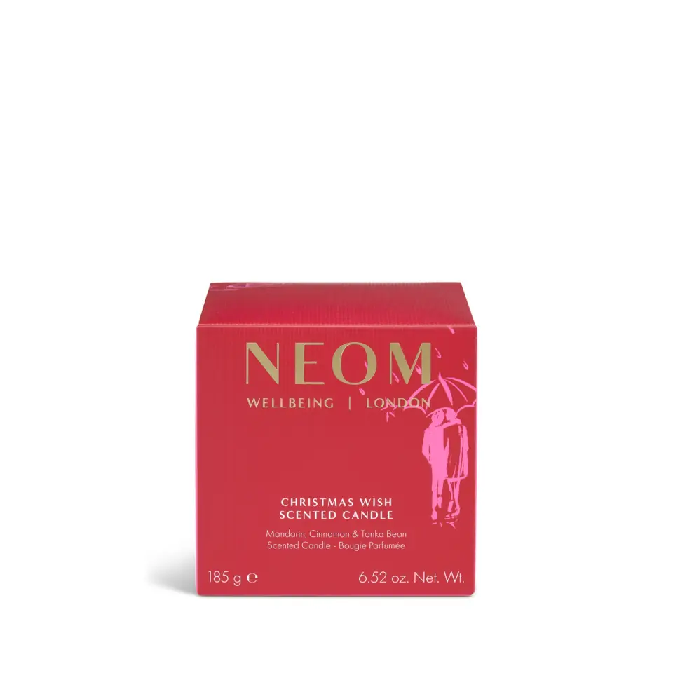Red box of NEOM Christmas Wish scented candle, 185g, with gold text and umbrella design.