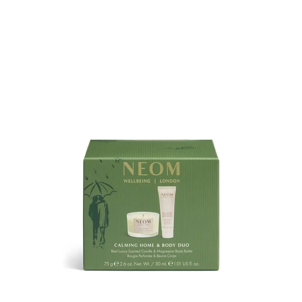 Green box with NEOM Wellbeing London logo, containing a candle and body butter duo.