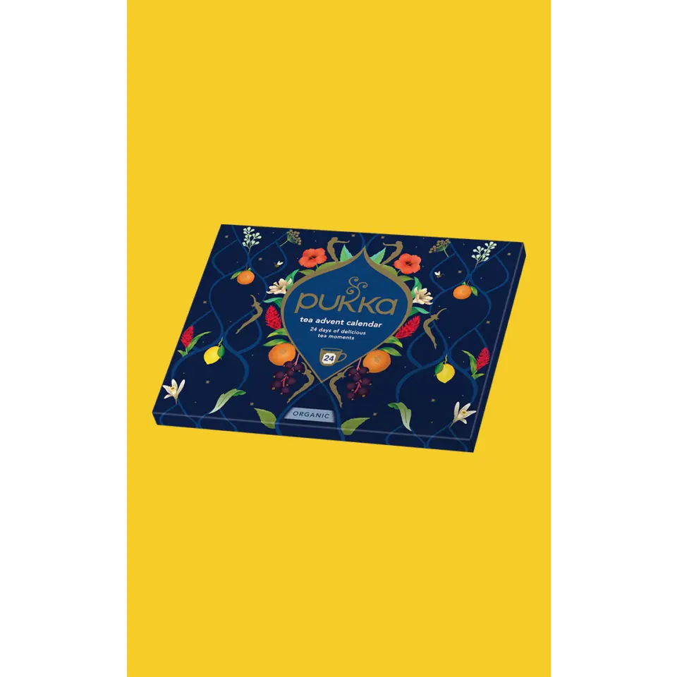 Pukka tea advent calendar with floral design on a yellow background.