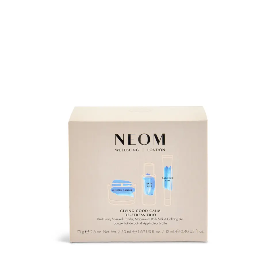 NEOM Wellbeing De-Stress Trio box with candle, bath milk, and calming pen.