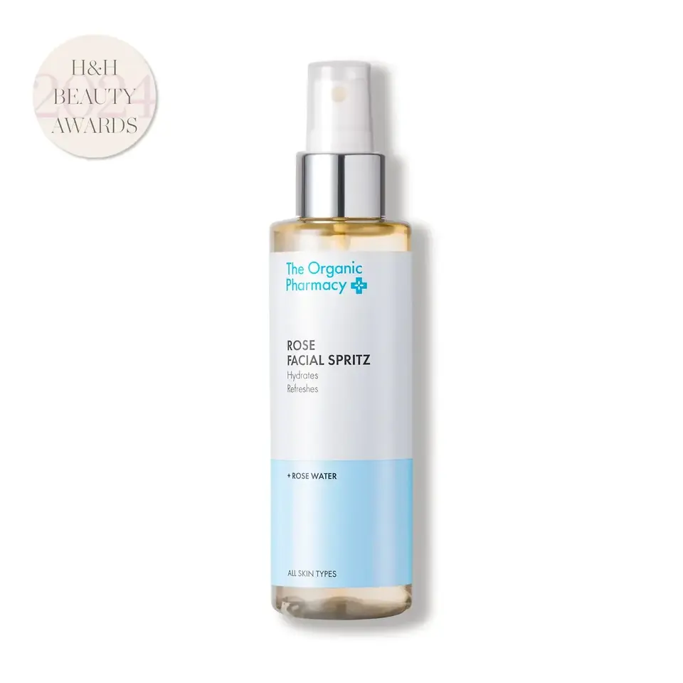 The Organic Pharmacy Rose Facial Spritz bottle with H&H Beauty Awards badge.
