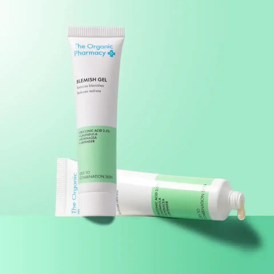 Blemish gel tubes on green background, labelled for oily to combination skin.