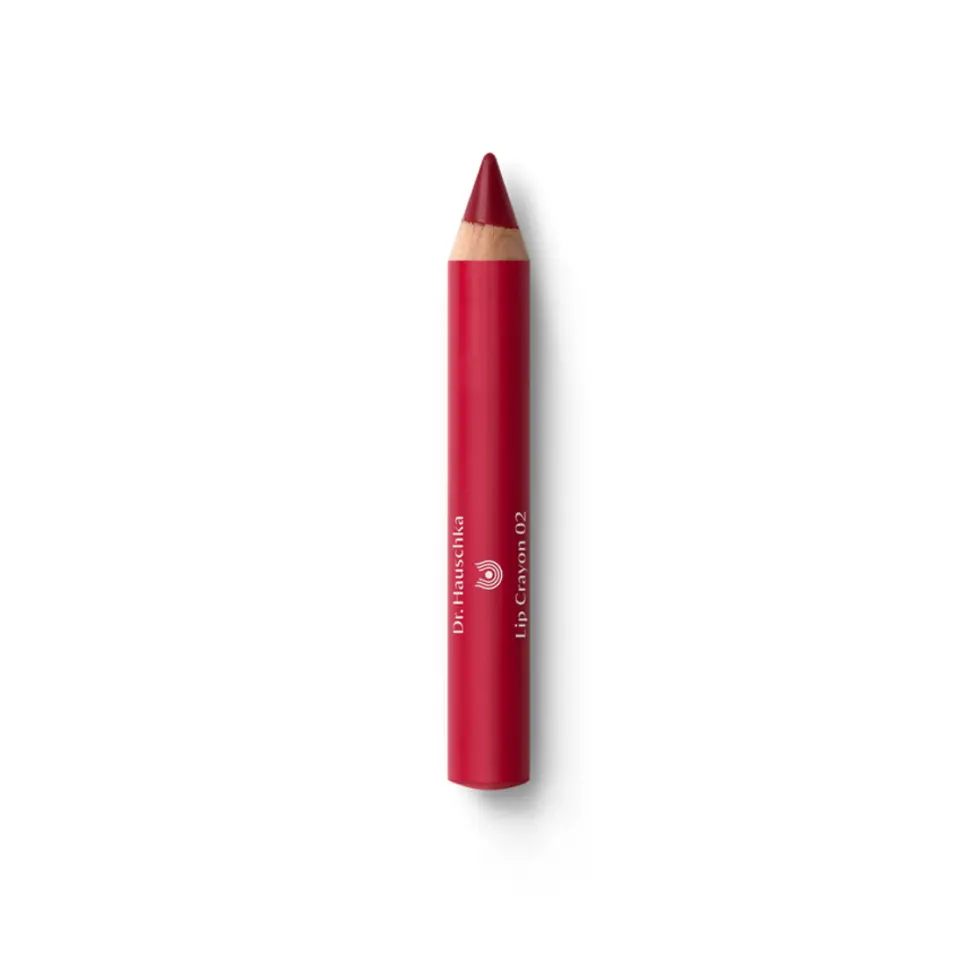Red lip crayon with text "Dr. Hauschka Lip Crayon 02" on white background.
