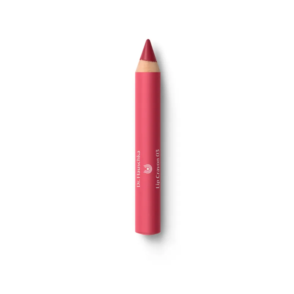 Red lip crayon with text: "Dr. Hauschka Lip Crayon 03".