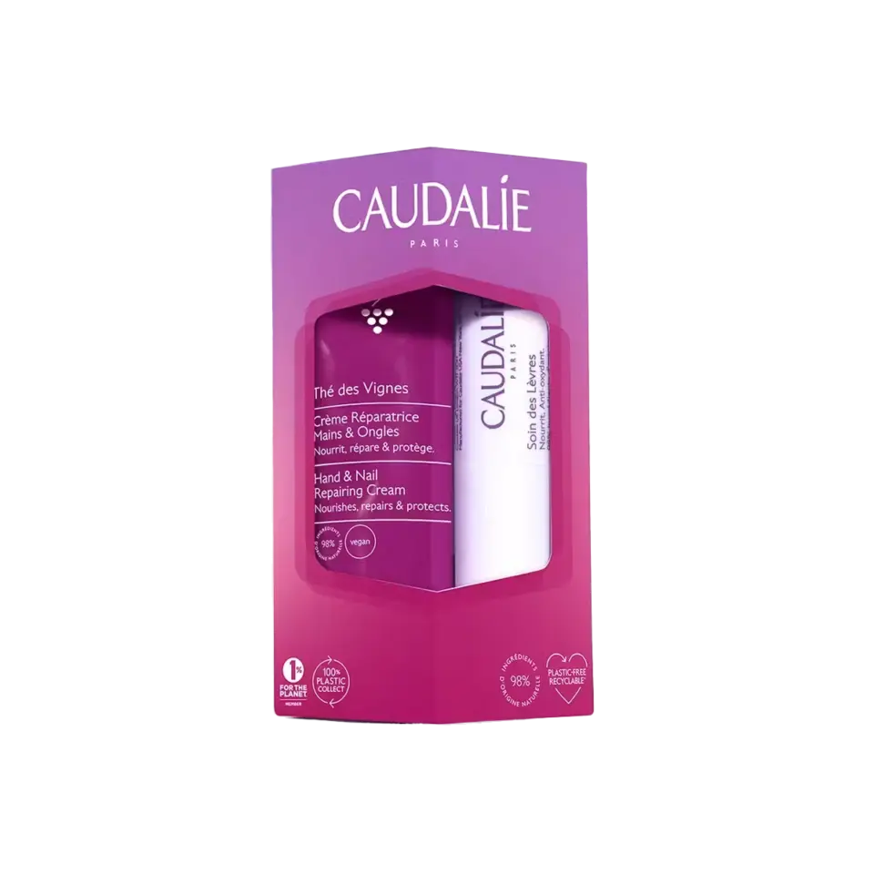 Caudalie gift set with hand cream and lip balm in purple packaging.