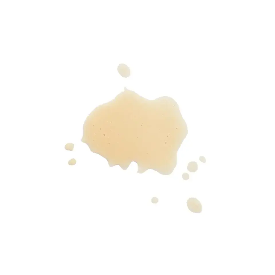 Beige liquid splash on white background.