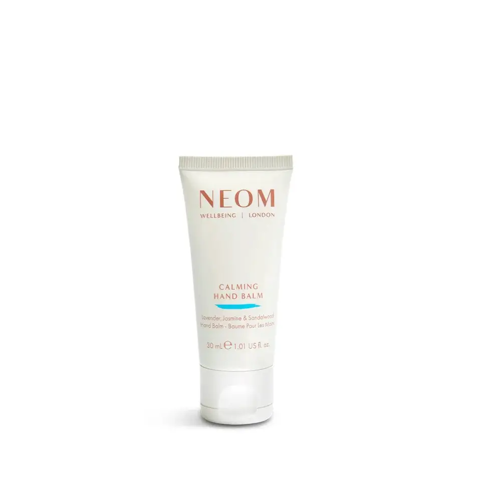 Tube of Neom Calming Hand Balm, 30ml, with lavender, jasmine, and sandalwood.