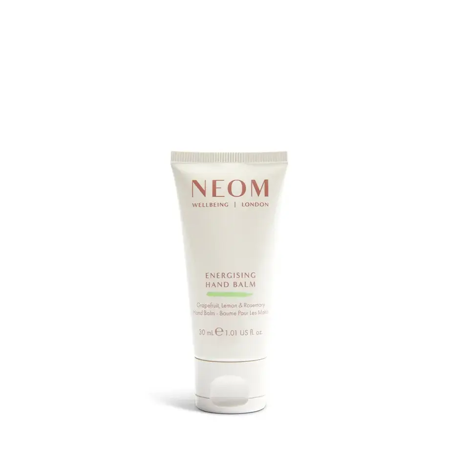 NEOM Wellbeing Energising Hand Balm, 30ml tube. Grapefruit, lemon, rosemary scent.