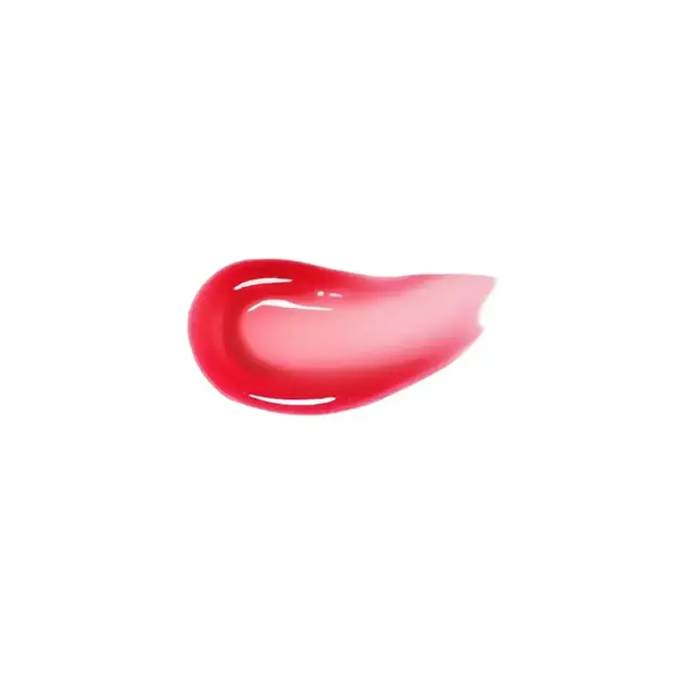 Red lip gloss smear on white background.