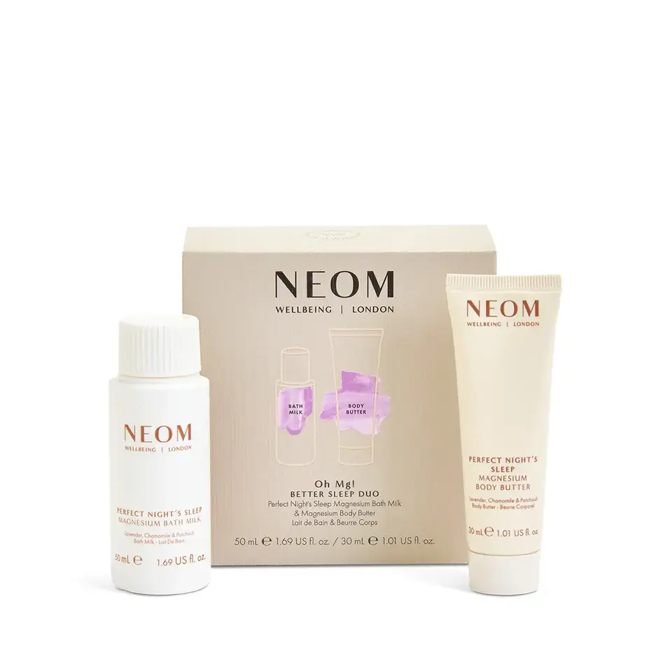 NEOM Better Sleep Duo with bath milk and body butter in front of packaging.