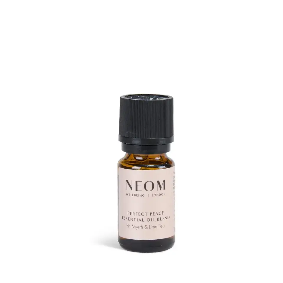 Neom Perfect Peace essential oil blend bottle with black cap.