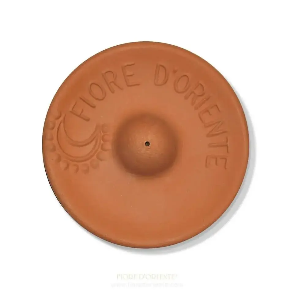 Terracotta incense holder with "Fiore D'Oriente" text and crescent moon design.