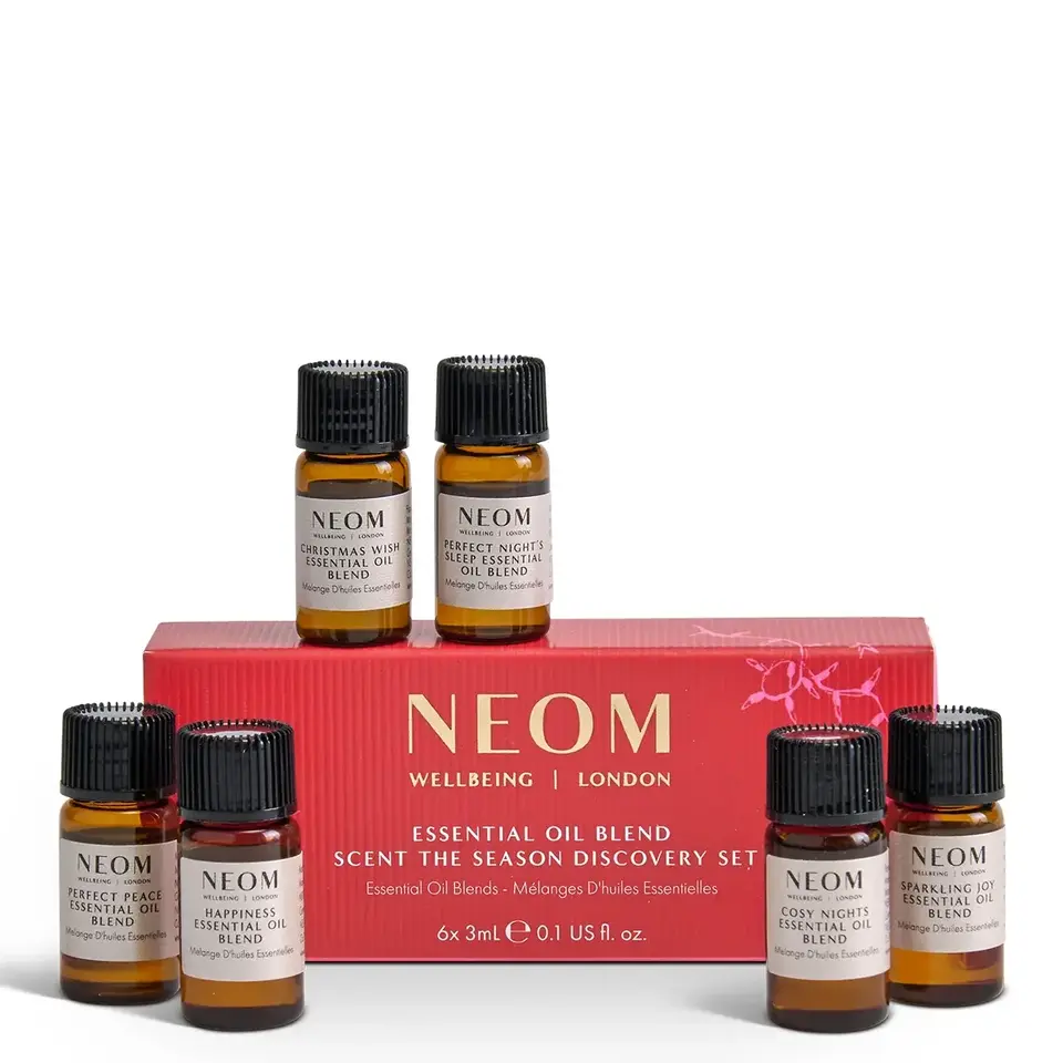 NEOM essential oil set with six bottles and red box.