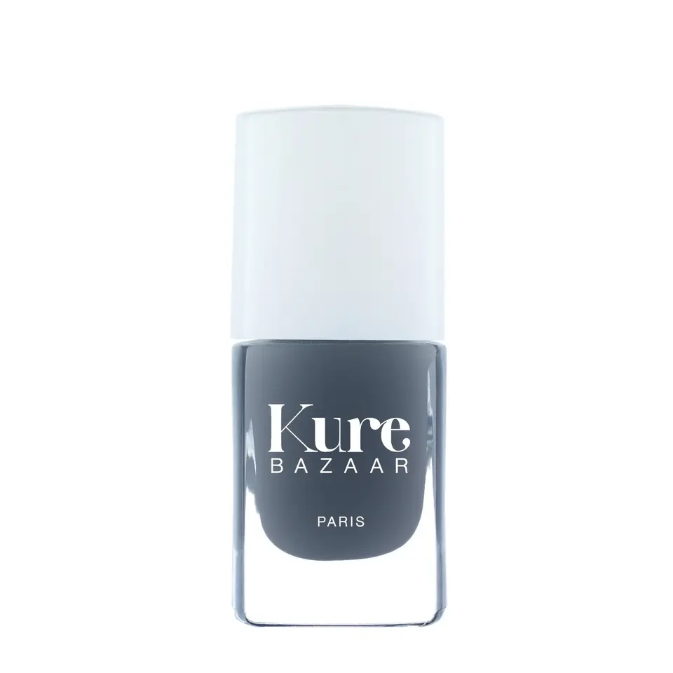 Kure Bazaar grey nail polish bottle with white cap.