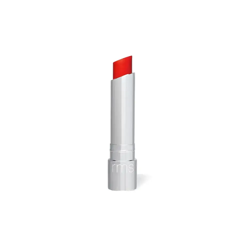 Silver tube of red lipstick with "rms" logo on the base.
