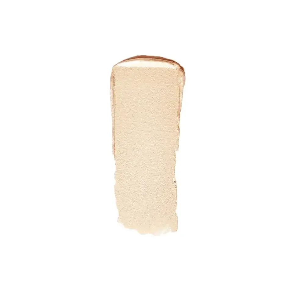 Beige foundation swatch on white background.