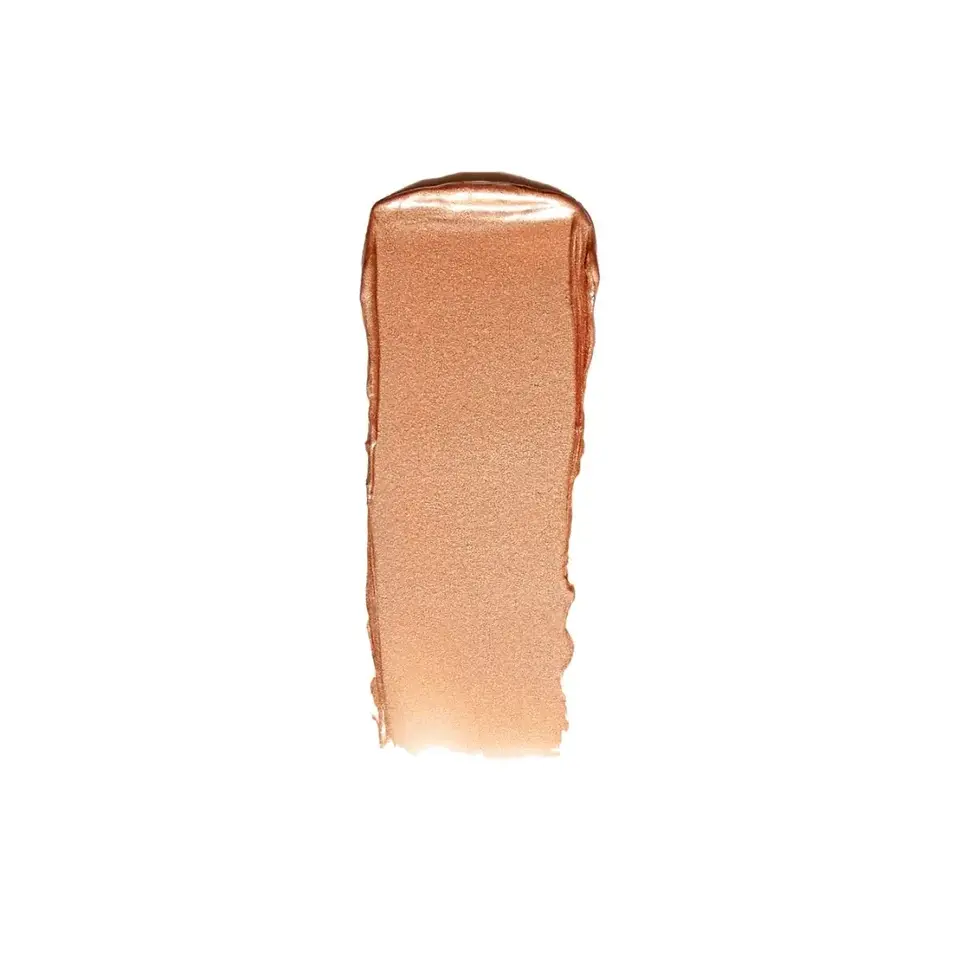 Copper-coloured makeup swatch on white background.