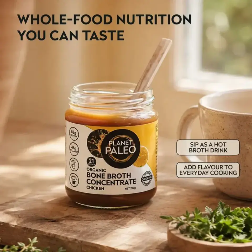 Planet Paleo bone broth jar on table with cup and herbs. Text: Whole-food nutrition you can taste.