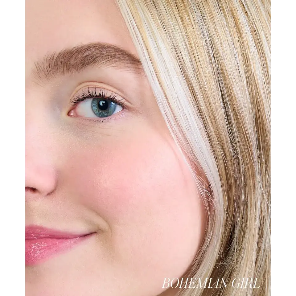 Close-up of a woman's face with blonde hair and blue eyes. Text: "BOHEMIAN GIRL".