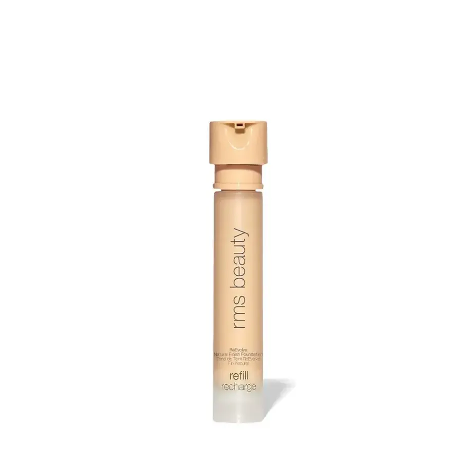 Beige cylindrical bottle with "rms beauty" text, labelled "refill recharge".
