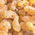 Close-up of amber-coloured frankincense resin pieces.