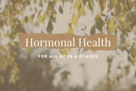 Hormonal Health text on leafy background.