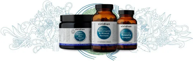 Viridian supplements and coconut oil jars with decorative floral background.