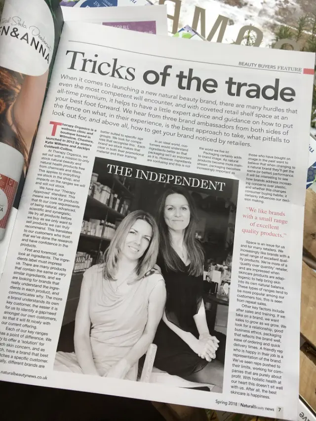 Magazine article titled "Tricks of the Trade" with a black and white photo of two women.