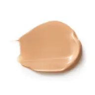 Beige foundation smear on white background.