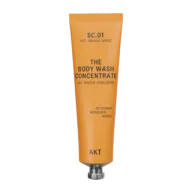 Orange tube of AKT body wash concentrate with citrus scents.