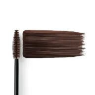 Mascara wand with brown mascara swatch on white background.