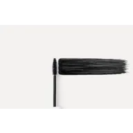 Mascara wand with black mascara stroke on a white background.