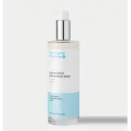 The Organic Pharmacy Chamomile Cleansing Milk bottle with pump dispenser.