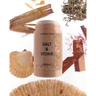 Salt & Stone deodorant with saffron, cedar, and natural elements around.