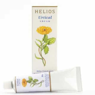 Helios Urtical Cream box and tube with yellow flower illustration.