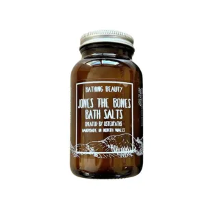 Brown jar of Jones the Bones Bath Salts, created by osteopaths in North Wales.