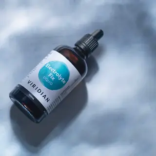 Viridian Electrolyte Fix Liquid bottle with dropper, 100ml, on a light surface.