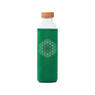 Glass bottle with wooden lid in green sleeve, geometric pattern on sleeve.