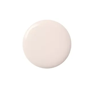 Cream-coloured liquid circle on white background.