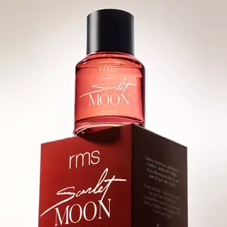 Red bottle of "rms Scarlet Moon" perfume on matching box.