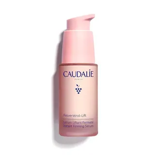Caudalie Resveratrol-Lift Instant Firming Serum in a pink pump bottle.