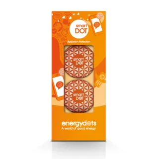 Orange packaging with two smartDOT discs for radiation protection. Text: "energydots".