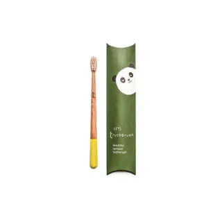 Bamboo toothbrush with yellow tip, green packaging with panda illustration. Text: "tiny truthbrush".