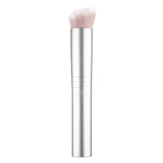Silver makeup brush with soft bristles and "rms" engraved on the handle.