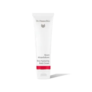 Dr. Hauschka Rose Nurturing Body Cream tube on white background.
