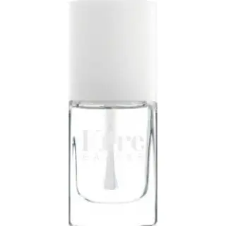 Clear nail polish bottle with white cap, labelled "Kure Bazaar".