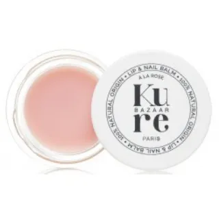 Kure Bazaar Paris lip and nail balm in a round container with a pink tint.