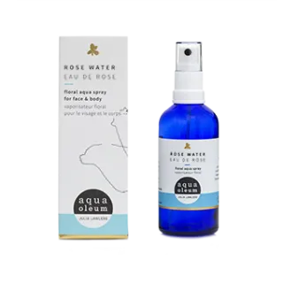 Blue bottle of rose water spray with packaging. Text: "Rose Water Eau de Rose".
