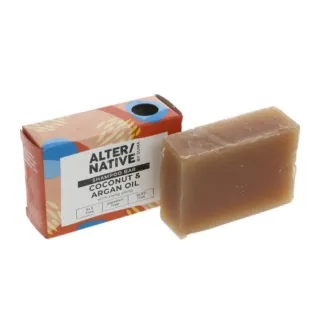 Shampoo bar with coconut and argan oil, packaging beside.